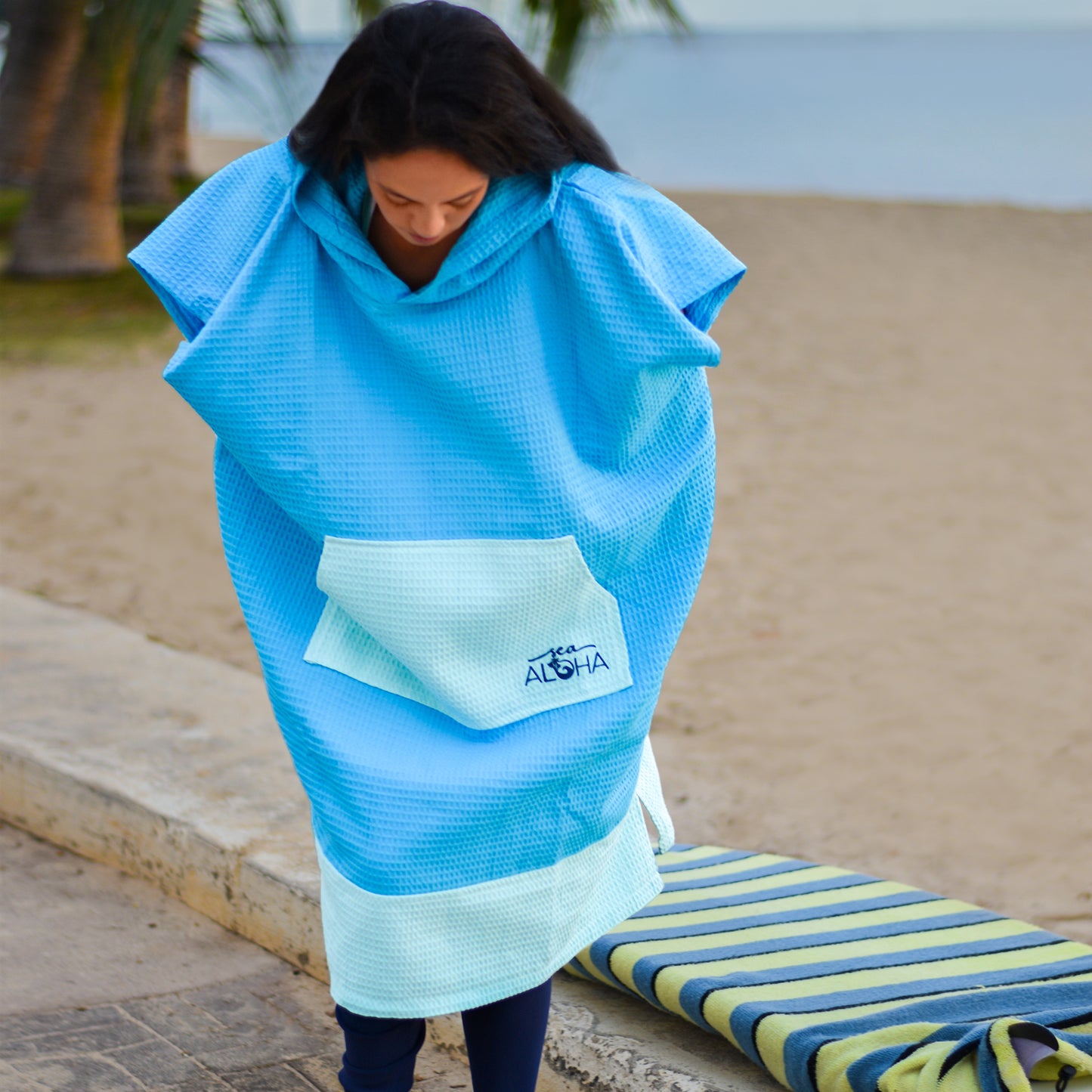 Blue surf poncho for changing